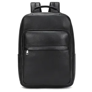 Black leather laptop backpack detail view, featuring premium grain texture and metal zipper.