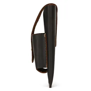Detailed close-up of retro genuine leather multi-tool belt sheath in dark brown crazy horse leather.