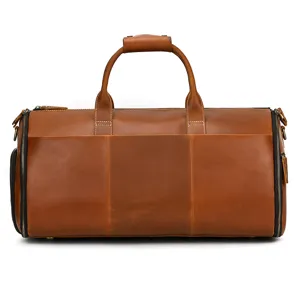 Detailed view of genuine leather travel duffel bag, featuring premium vintage brown finish.