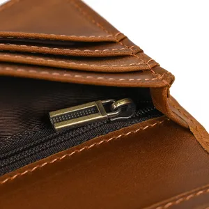 Men's vintage leather wallet detail view featuring multi-card slots and zipper pocket.
