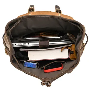 Vintage genuine leather backpack interior structure showing large capacity and multi-pockets.
