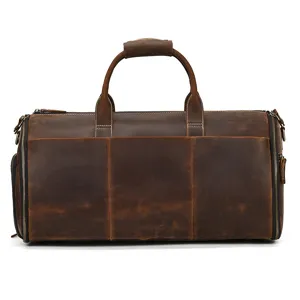 Detailed view of brown leather travel duffel bag, vintage business luggage and gym bag.