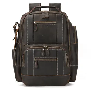 Vintage leather backpack for men, large capacity business travel rucksack with multiple pockets.