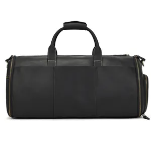 Detailed view of the black leather travel duffel bag showing zipper and durable handle.