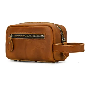 Genuine leather toiletry bag for men, vintage brown cosmetic travel pouch with side handle.