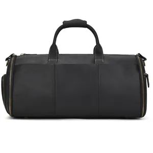Black genuine leather travel duffel bag detail, multi-functional design with spacious storage.