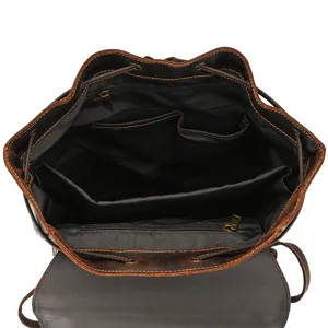Vintage crazy horse leather backpack interior detail shot, large capacity multi-compartment.