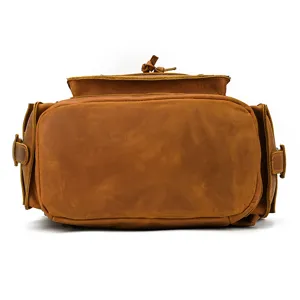 Retro crazy horse leather backpack detail view, genuine leather brown travel bag bottom.