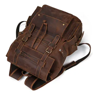 Vintage crazy horse leather backpack with spacious double compartments and durable metal hardware.