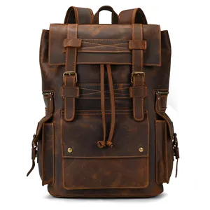 Vintage leather backpack detail shot showcasing premium crazy horse leather texture and metal buckles.