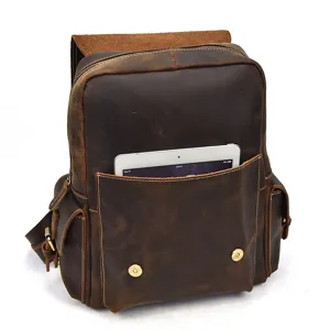Detail view of retro crazy horse leather backpack for men, brown leather travel school bag.