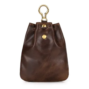 Vintage genuine leather coin purse with metal clasp and hook, detailed leather texture view.