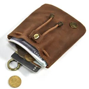 Vintage handmade vegetable tanned leather coin purse with drawstring and card slot for women.