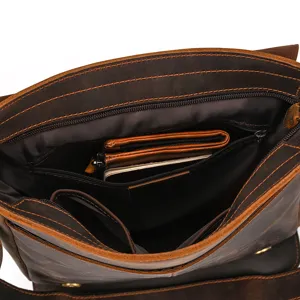 Bolso bandolera de cuero vintage para hombre vista interior detallada, gran capacidad.