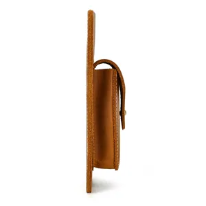 Side profile detail of the brown leather belt pouch showcasing quality stitching and build.