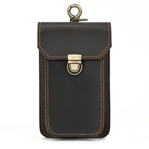 Detailed view of the dark brown genuine leather phone waist bag with sturdy metal hook.