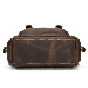 Detailed view of the bottom and retro leather texture of the vintage crazy horse leather backpack.