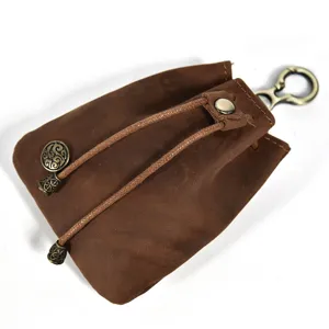 Vintage handmade leather coin purse mini wallet retro change bag with metal clasp hook detail.