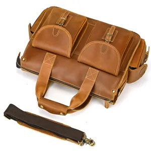 Detail view of men's vintage crazy horse leather briefcase, multi-pocket laptop bag with strap.