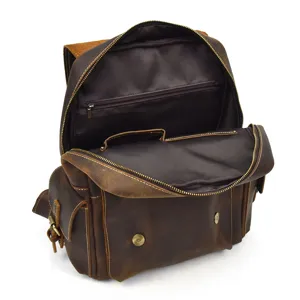Detail view of the brown genuine crazy horse leather backpack interior and zipper compartment.