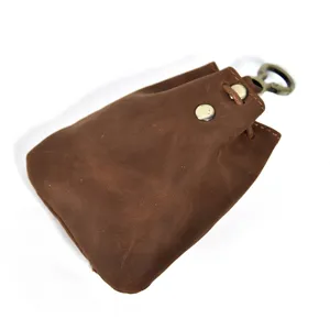 Vintage leather coin purse with metal clasp, mini handmade change wallet for women and girls.