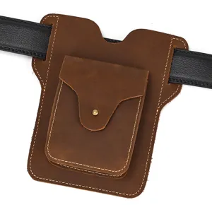 Close-up detail of vintage brown crazy horse leather belt waist pouch for men phones.