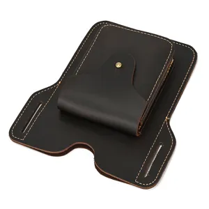 Genuine leather phone holster detail showing sturdy belt loop and durable contrast stitching.