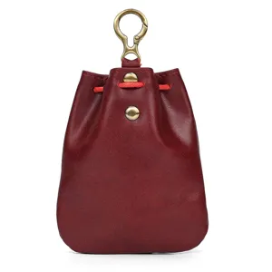 Vintage vegetable-tanned leather coin purse mini wallet with brass hook and red drawstring.