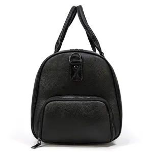 Men's genuine leather travel duffel bag detail view showcasing premium black cowhide texture.