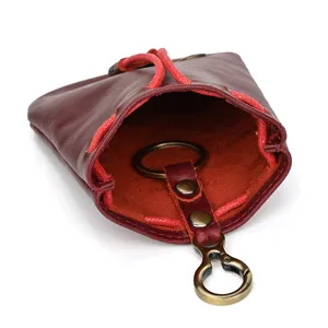 Vintage handmade vegetable tanned leather coin purse detail, mini zip key pouch for women.