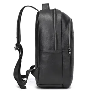 Side detail view of black leather backpack with durable metal zippers and comfortable straps.