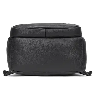 Detail view of men's genuine cowhide leather business laptop backpack in black color.