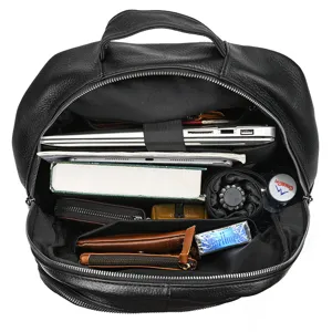Men's black leather business backpack interior detail showing large capacity compartments for laptop