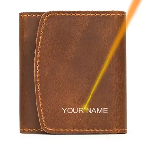 Detailed view of brown vintage crazy horse leather wallet with snap button and custom engraving.