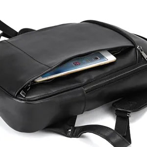 Detailed view of black leather men business backpack with front zipper pocket for tablet storage.