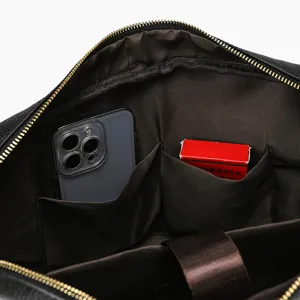 Interior detail of men leather business briefcase with multi pockets and compartments.