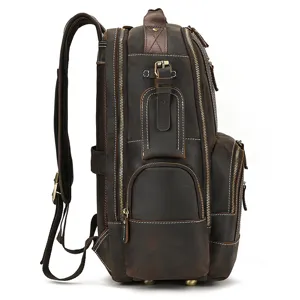 Vintage brown genuine crazy horse leather backpack, side view showing multiple zipper pockets and sturdy build.