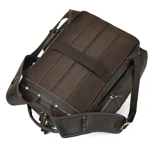 Vintage dark brown genuine crazy horse leather backpack back panel with breathable mesh straps.