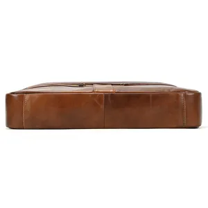 Brown leather briefcase bottom detail view business men bag close up photography