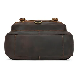 Close-up detail of vintage crazy horse leather backpack for men, showing genuine cowhide texture.
