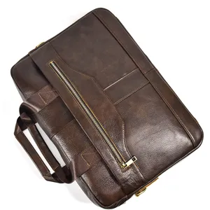 Detailed view of brown leather men briefcase, business laptop bag with zipper pocket.