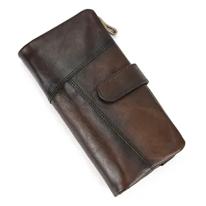Vintage leather long wallet detail shot showcasing genuine cowhide texture and card slots.