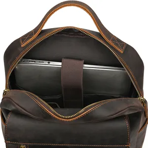 Detail view of retro crazy horse leather backpack interior with dedicated laptop pocket.