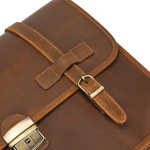 Bolso hombre cuero marron detalle cartera vintage hebilla metalica bandolera maletin