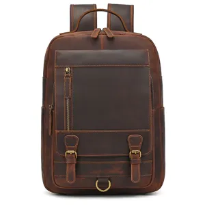 Close up view of vintage crazy horse leather backpack with detailed straps and metal buckles.