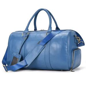 Men's blue genuine leather travel duffle bag with shoe compartment and shoulder strap.