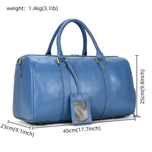 Blue leather travel duffel bag with spacious compartment, sturdy handles and luggage tag.
