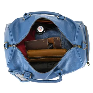 Detailed view of the blue leather travel duffel bag interior capacity and storage compartment.