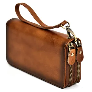 Cartera larga de cuero vintage para hombre con doble cremallera y correa de muñeca.