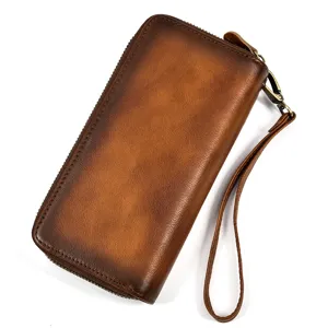 Cartera larga de cuero genuino vintage para hombre con correa de muñeca elegante.